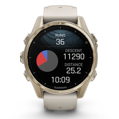 Garmin Fenix 8 Sapphire - 43 mm / AMOLED - Soft Gold avec bracelet en silicone gris brouillard/grès foncé - Montre multisport premium